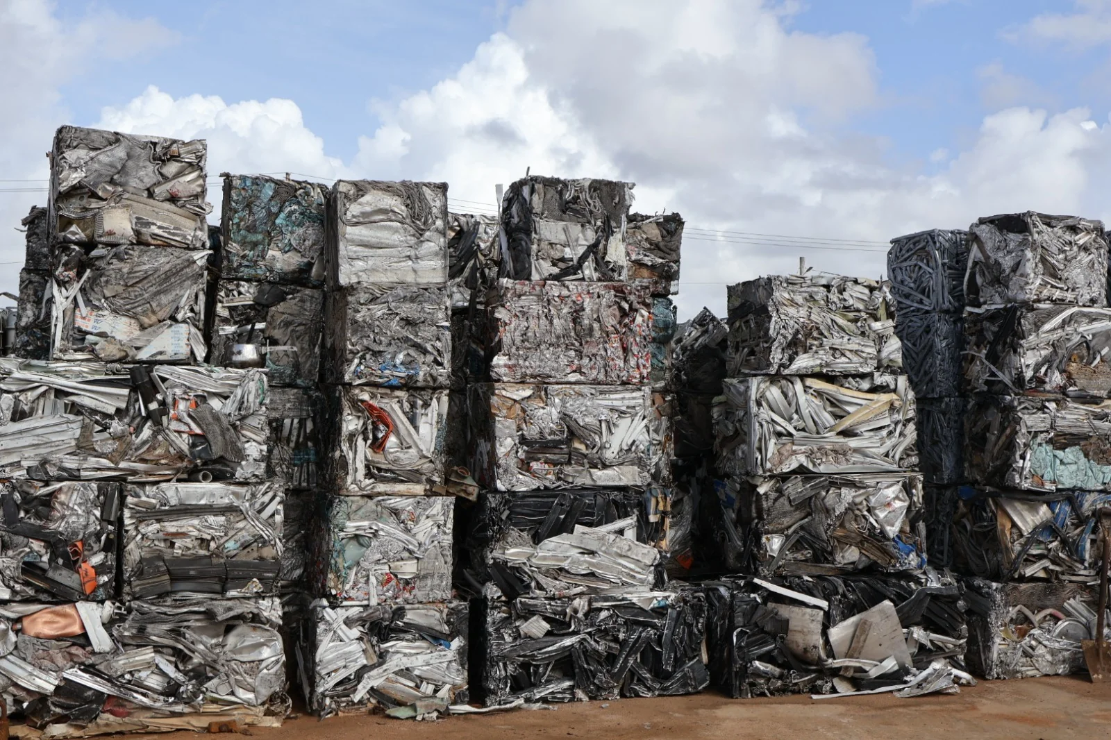CEVONS scrap metal yard with ferrous and non-ferrous material sorted for export