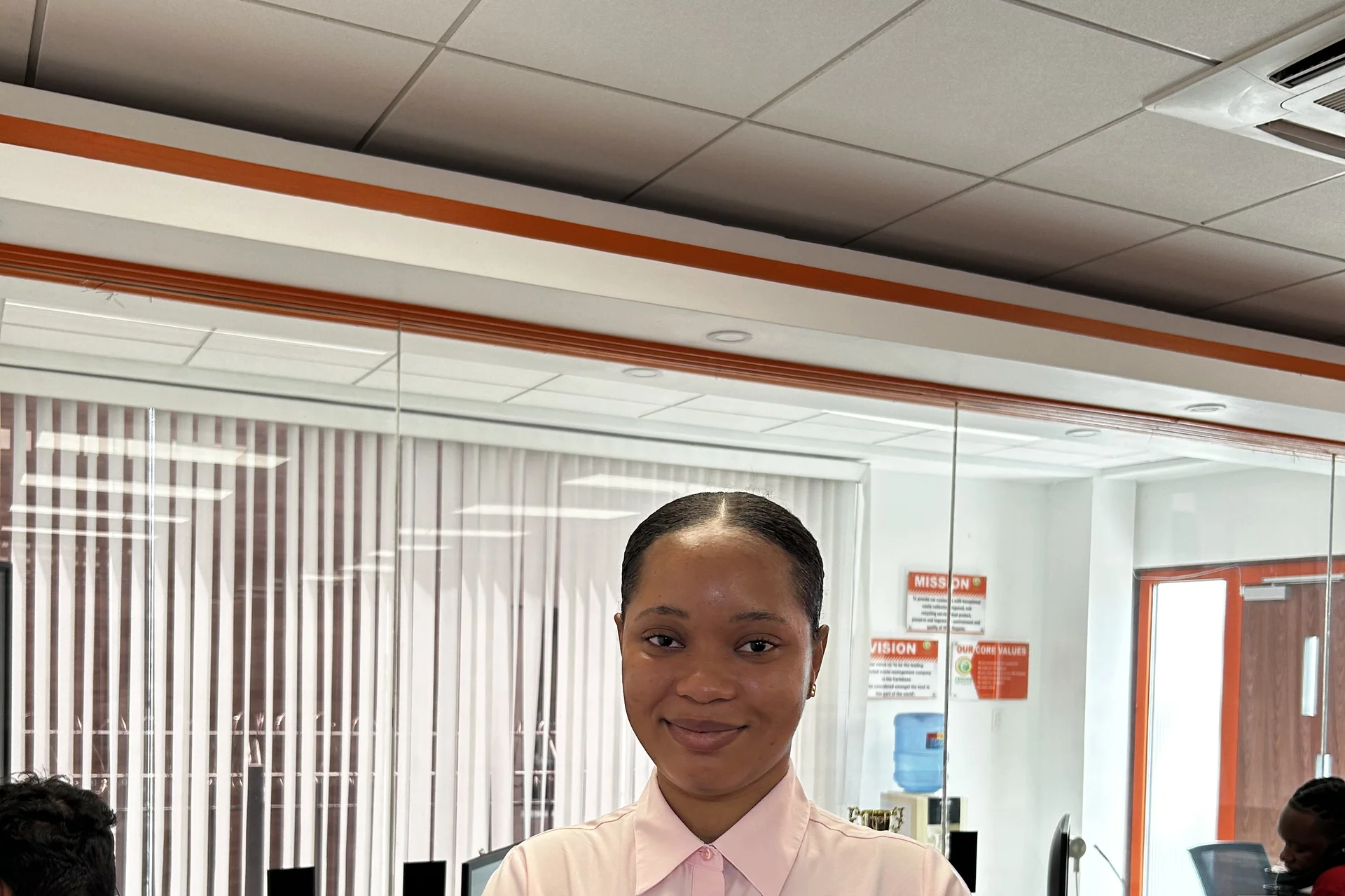 CEVONS front-office team member welcoming customer inquiries at the Georgetown office