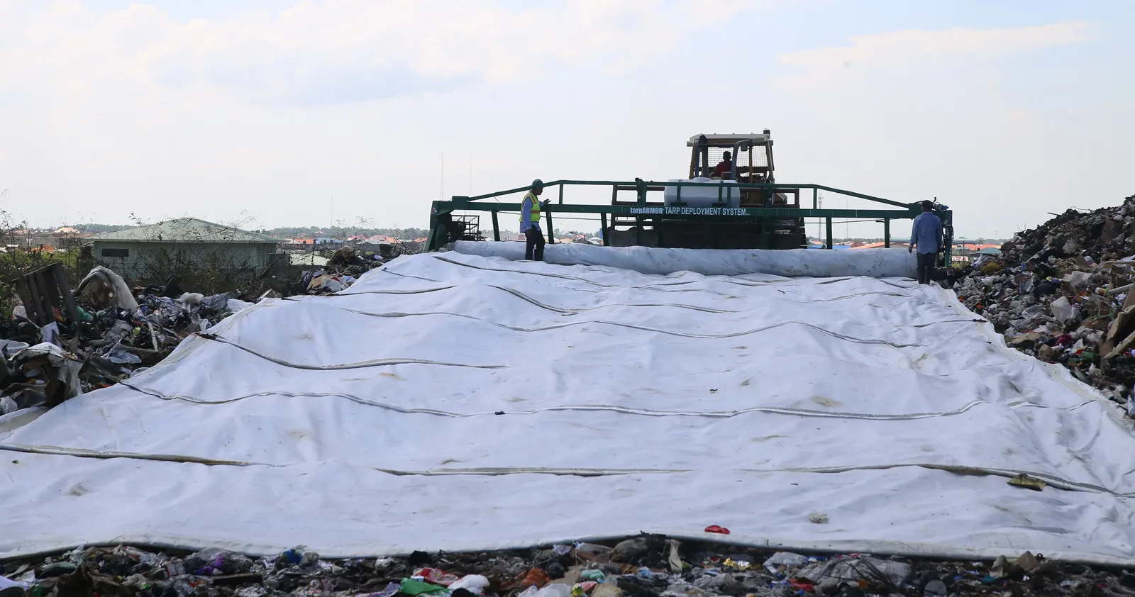 CEVONS EPA-approved tarp daily cover system on landfill working face