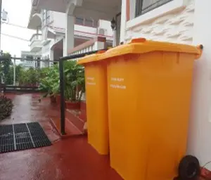 CEVONS collection crew emptying household bins