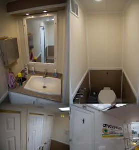 Interior of a CEVONS portable toilet showing hygiene fixtures