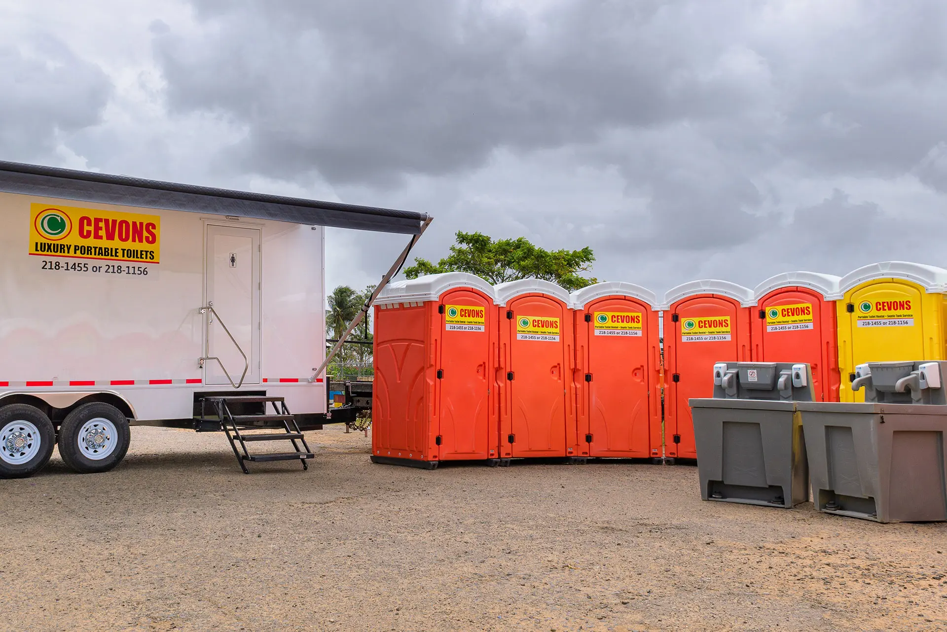 CEVONS portable toilet units arranged for an outdoor event